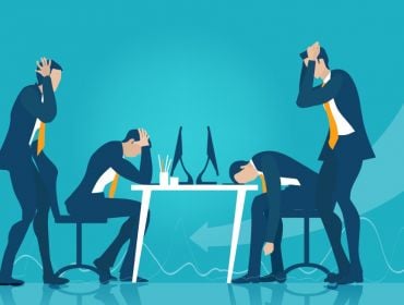 Cartoon showing people dealing with bad management at work. They have their heads down on their desks in despair and others are standing around clutching their heads stressed out.