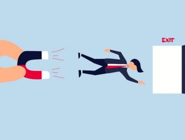 Talent retention concept cartoon showing a giant hand with a magnet trying to attract an employee flying out a door marked exit.