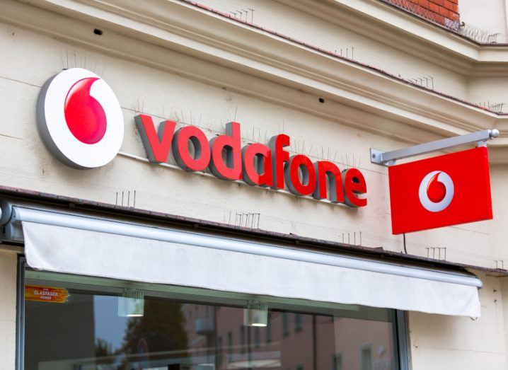 The Vodafone logo on the front of a building.