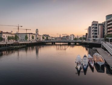 A view of the River Lee with Cork City hall in the background.