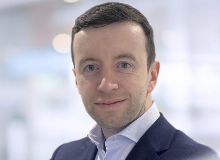 Headshot of a man in a suit and a white shirt. He is David Moloney of Aon.
