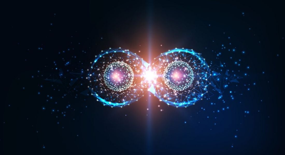 An image of what looks like two qubits touching, symbolising quantum computing and future physics concepts.